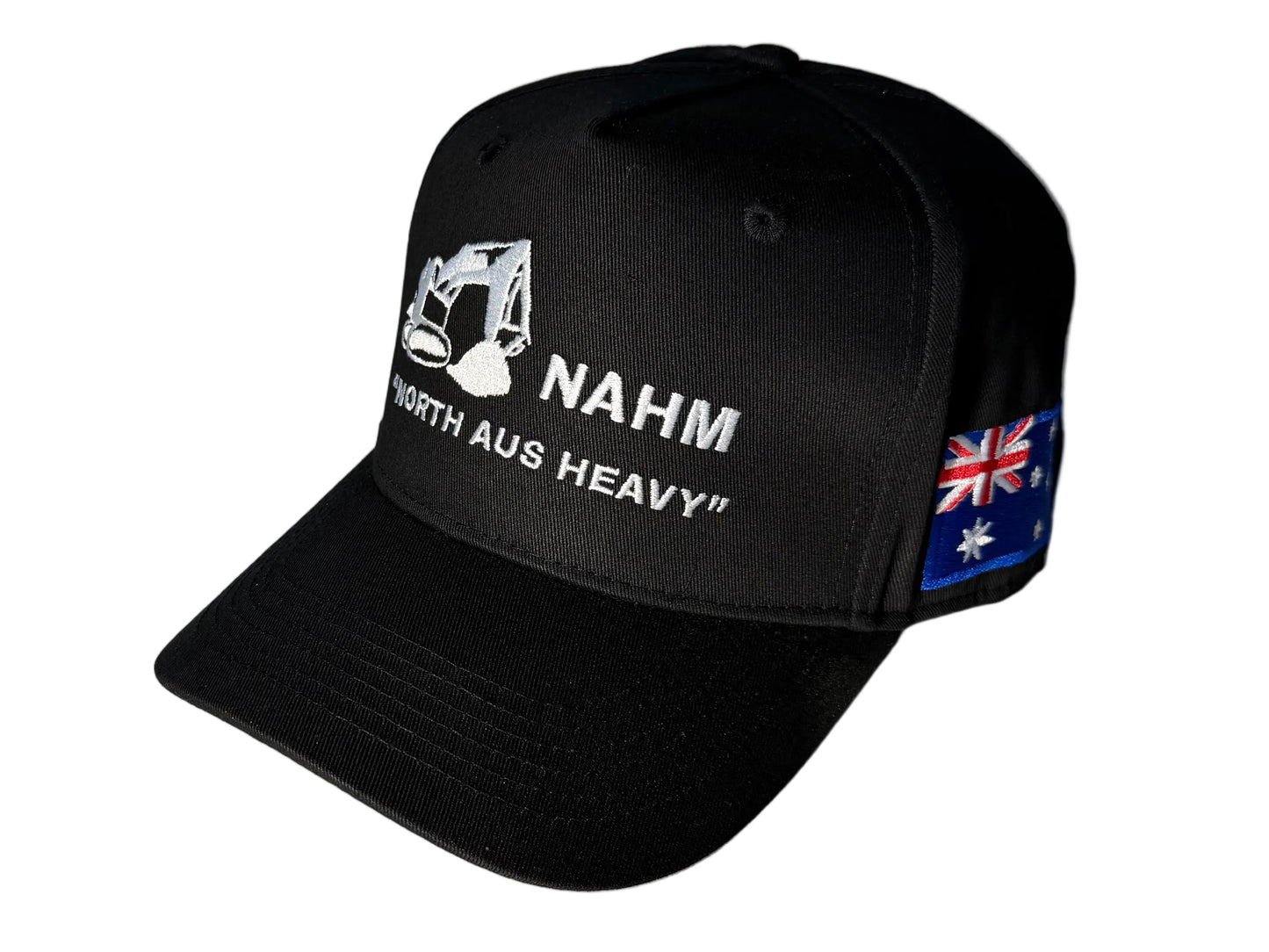 A black trucker-style cap with white embroidered text reading 'NAHM NORTH AUS HEAVY' and a small Australian flag patch on the side.